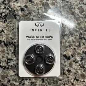 999mbyx000 Nissan Genuine Valve Stem Caps