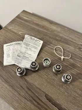 999w2-3x000 Nissan Used Bag Infiniti Oem Wheel Lock Set Part #