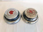 Two 1920'S 1930'S Pontiac Hubcaps, Unused 8", 1940'S Reproductions Wall Hangers. Price: $75.00.