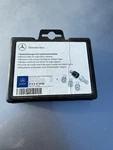Oem Mercedes Benz Set Of Four Silver Rim Wheel Locks Key Short B66470156 Used. Price: $25.00.