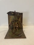 Vintage Cooper Art Single Book End Wagon Wheel Country Western Style Used. Price: $8.00.