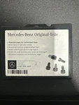 Authentic Oem Mercedes-benz Wheel Lock Kit A001 990 1607 Black Color **short** Used. Price: $20.00.