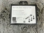 Mercedes Benz Genuine Lockable Wheel Bolt Nut Black A0009909719 Oem ST28 Used. Price: $40.00.