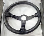 Status: Racing Carbon Fiber Deep Dish Steering Wheel Used. Price: $149.00.